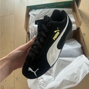 Puma Black and White Shoes with Gold Details